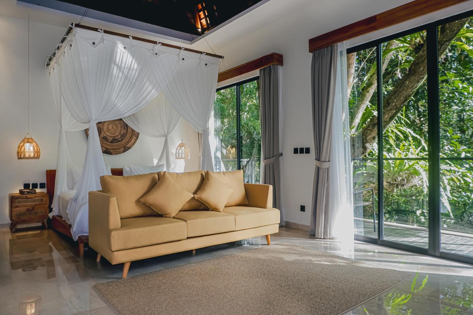 The Sebali Resort Ubud Extérieur photo A bedroom at the resort